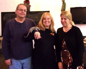 Three adults during the Animal Tales program