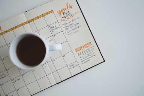 Calendar with coffee cup
