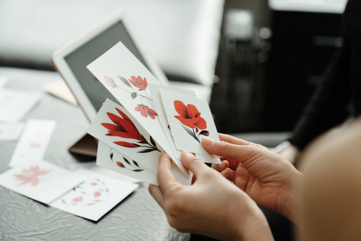 woman holding flower stickers